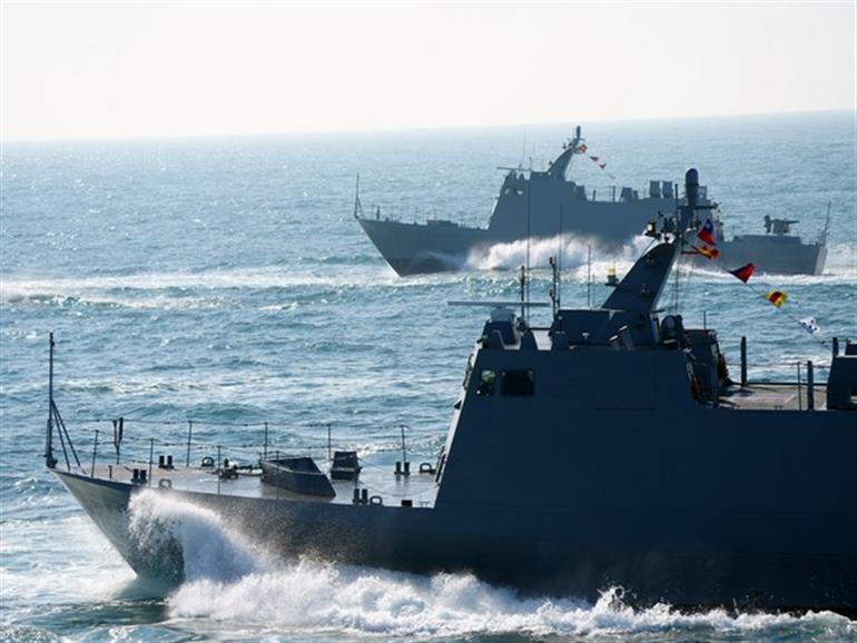Chinese vessel runs aground near Philippine-held Island, troops on alert