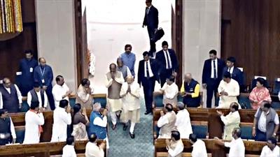 PM Modi receives standing ovation as he walks into new Parliament building