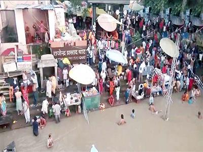 Varanasi: Devotees take holy dip in River Ganga after total lunar eclipse