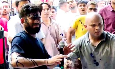Ink thrown at Cockroach Janata Party founder Abhijeet Dipke during Jantar Mantar protest